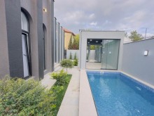 Mərdəkanda yeni 1 mərtəbəli ev satılır. 3 sot torpaq sahəsi, -5