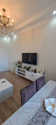 İnşatçılar prospekti,Statistika komitəsinin yanı Köhnə Tikili, -3